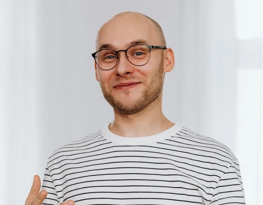 bald man smiling