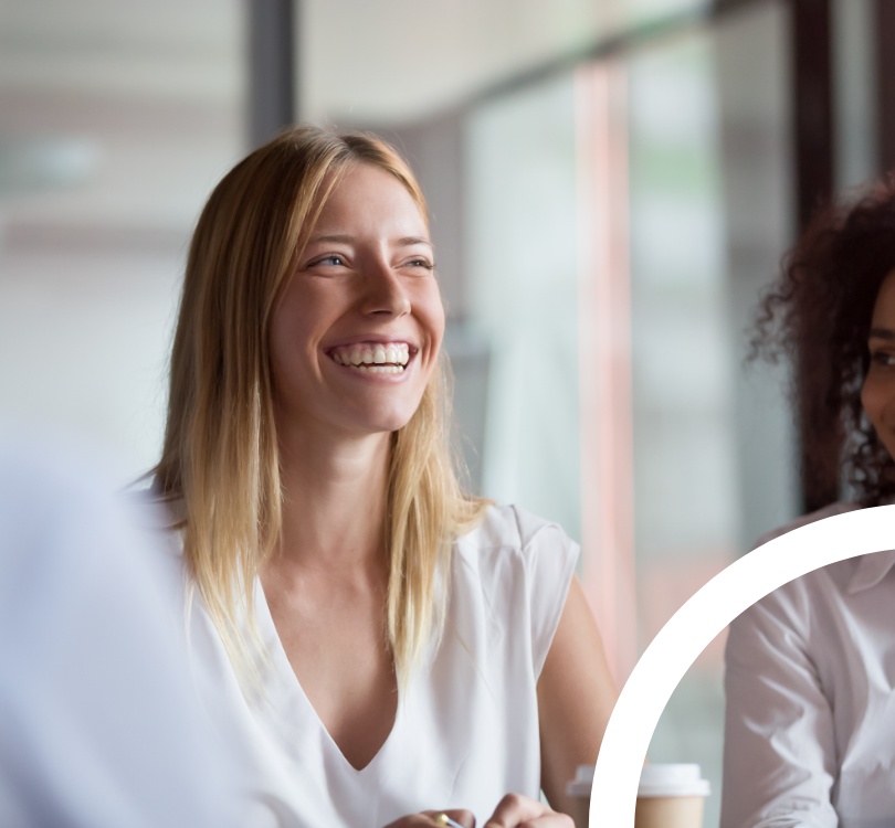 person smiling in meeting